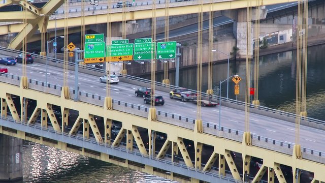 Traffic flows over the Fort Pitt Bridge in Pittsburgh, Pennsylvania. In 4K UltraHD.	