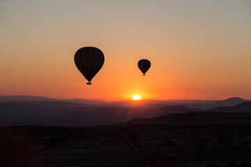Epic sunrise with baloons over cappadocia