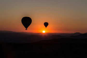 Epic sunrise with baloons over cappadocia