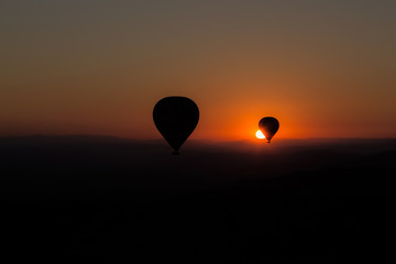 Epic sunrise with baloons over cappadocia