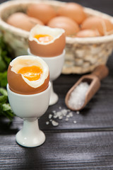 Boiled eggs on dark background