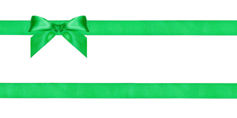 one green bow knot on two parallel silk ribbons