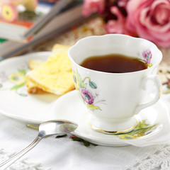 Antique tea cup on the table