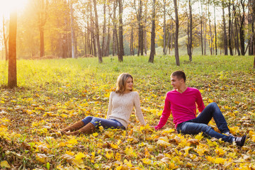 Happy couple in the autumn park