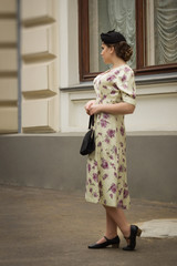 Very beautiful soviet girl in retro style is on the Moscow stree