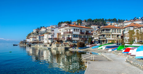 view of a typical houses situated at the edge of ohrid unesco heritage city in fyrom macedonia. - obrazy, fototapety, plakaty