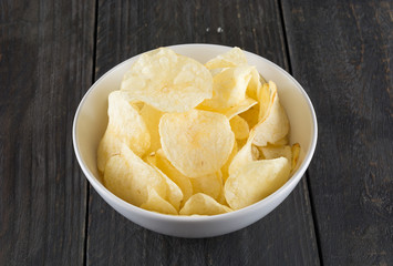 potato chips on wood background