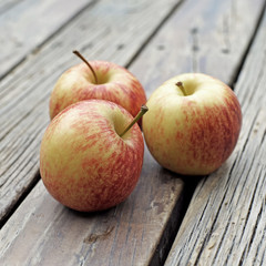 sweet apple fruit on wooden floor