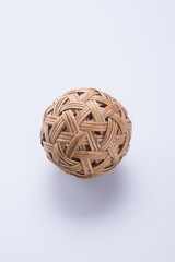 ball. rattan ball on the background
