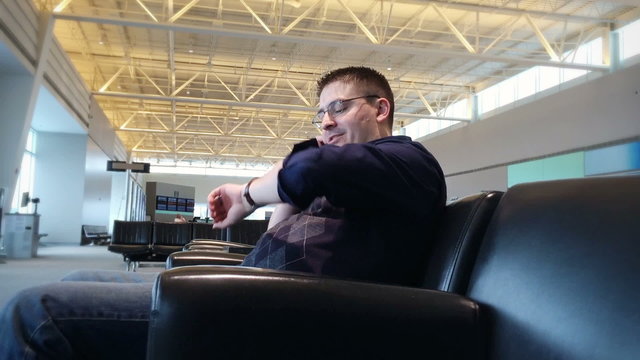 Man Talks on Phone at Airport 3966