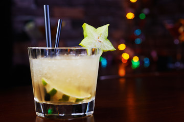 glass of delicious alcoholic cocktails or lemonade with ice and