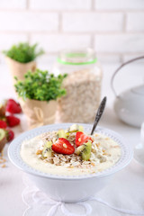 Healthy breakfast with homemade oatmeal, close up