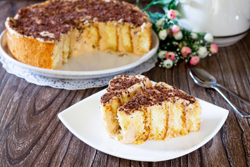 Sponge cake with whipped cream and condensed milk