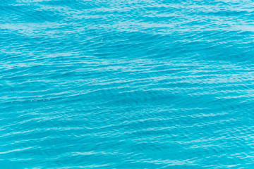 Blue ripple water wave in sea ocean.