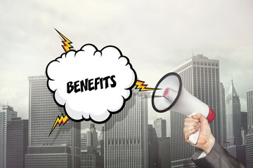 Benefits text on speech bubble and businessman hand holding