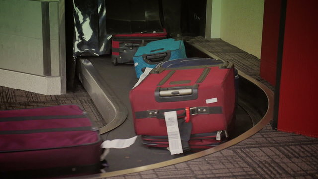 Luggage Arrives at the Baggage Claim Area 4044