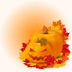 two halloween pumpkins with fall maple leaves