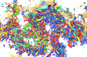 Fototapeta premium Shavings from multicolored pencils on white background