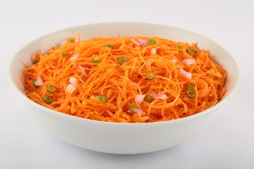 Delicious and spicy carrot spaghetti with ginger, garlic, chili and lemon.