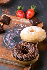 Donuts with fresh strawberries and chocolate