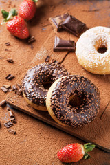 Donuts with fresh strawberries and chocolate