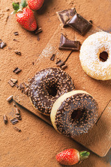 Donuts with fresh strawberries and chocolate