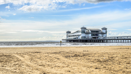 Seaside beach with pier