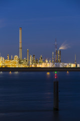 Fototapeta premium Chemical Plant In Harbor At Night