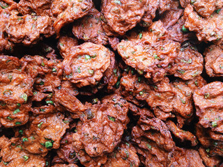 fried fish patty,A kind of food Use of fish or shrimp, mixed with chilli pepper well until sticky, then fried in oil.
