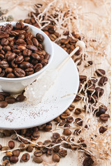 Green, brown and black coffee beans