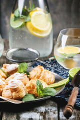 Cakes profiteroles with lemonade