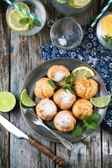 Cakes profiteroles with lemonade