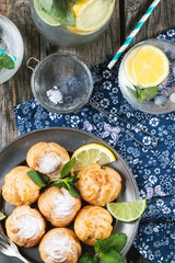 Cakes profiteroles with lemonade
