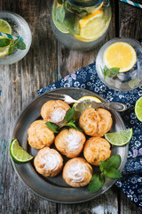 Cakes profiteroles with lemonade