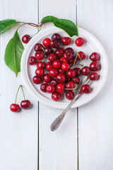 Plate of fresh cherries