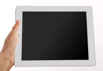 Female hands holding tablet with blank screen isolated on white