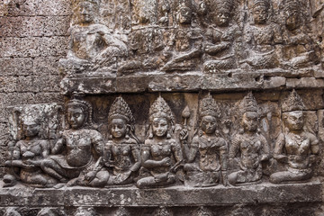 Apsara carvings status on the wall of Angkor temple, world herit
