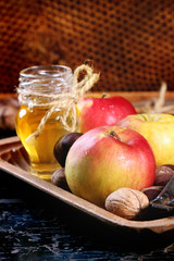 Obraz na płótnie Canvas Honey, nuts and apples