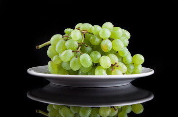 White grapes on a black background