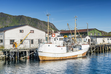 Fototapeta na wymiar Fishing boat moored in the fishing port. Lofoten arcghipelago.