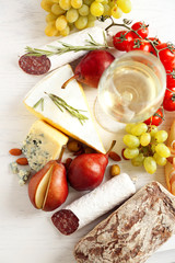 Still life with various types of Italian food and wine