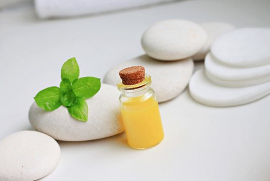 domestic skincare orange aroma oil fresh herbs white natural spa background