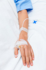 A patient in the hospital with saline intravenous (iv)