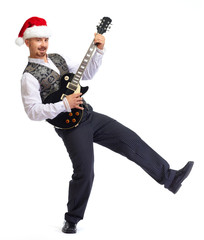 Christmas santa man with electric guitar.