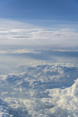 Fototapeta premium clouds sky sunset. view from the window of an airplane flying in