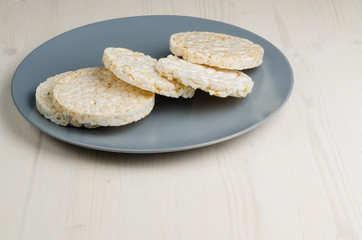 rice cake, puffed rice on table 
