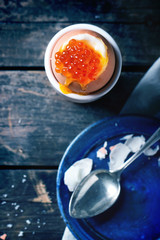 Soft-boiled egg with red caviar
