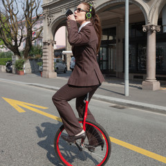 businesswoman with unicycle © alexandre zveiger