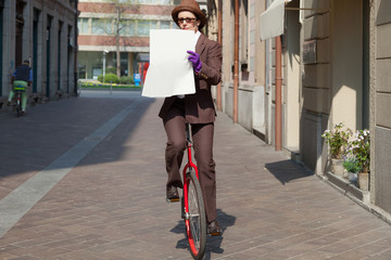 businesswoman with unicycle © alexandre zveiger