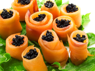 Salmon rolls with caviar